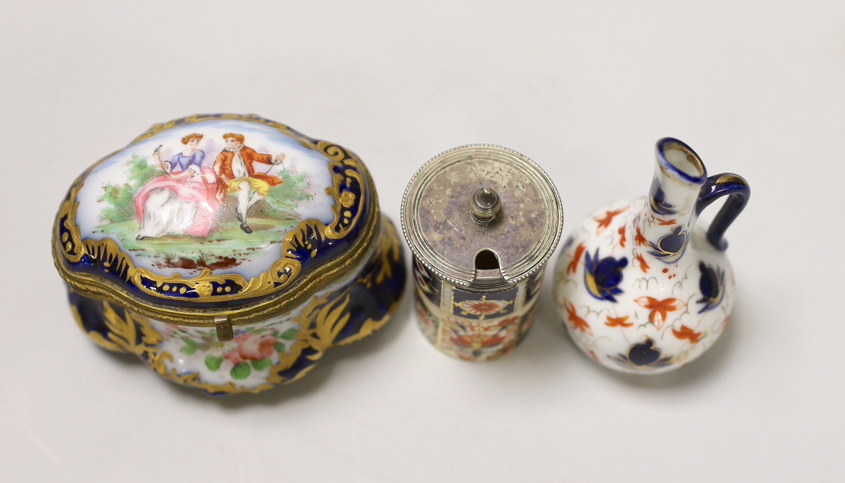 A pair of Vienna style porcelain pink ground vases, late 19th century, a Sevres style trinket box, and other ceramics. Tallest 16cm